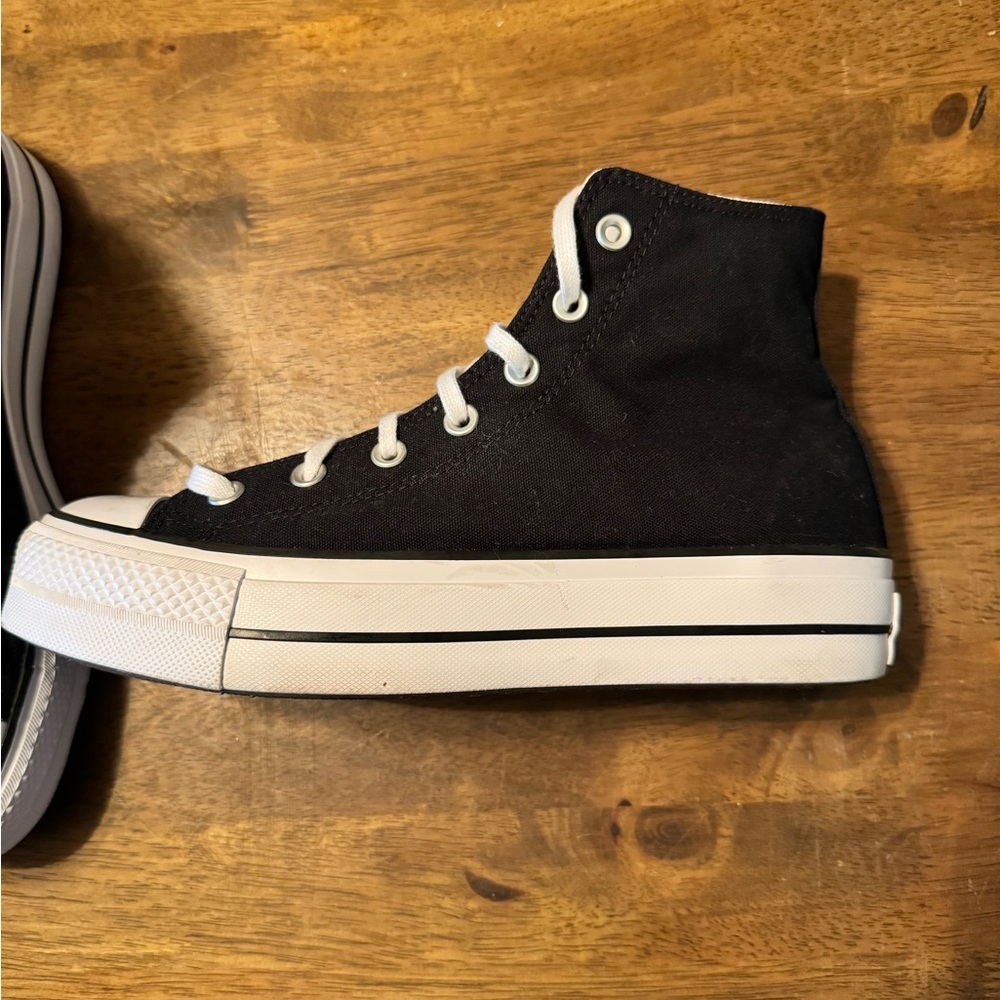 Women’s high top platform Chucks
(Worn one time for a party)